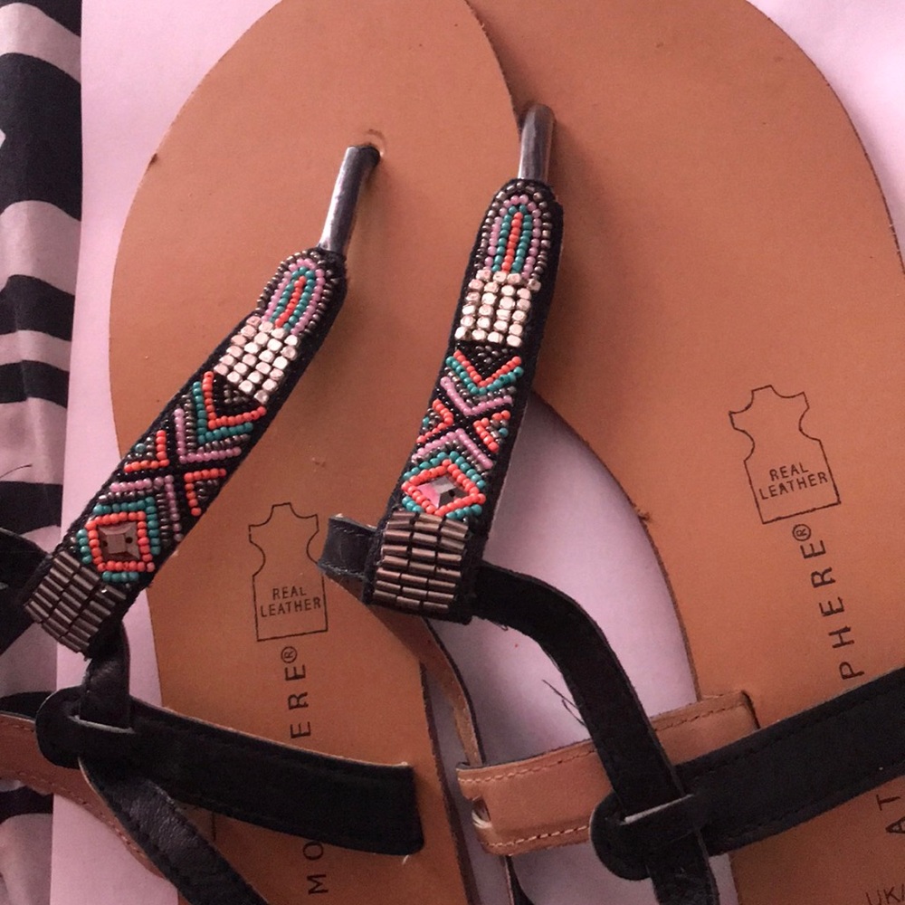Brown sandals with tribal beading detail